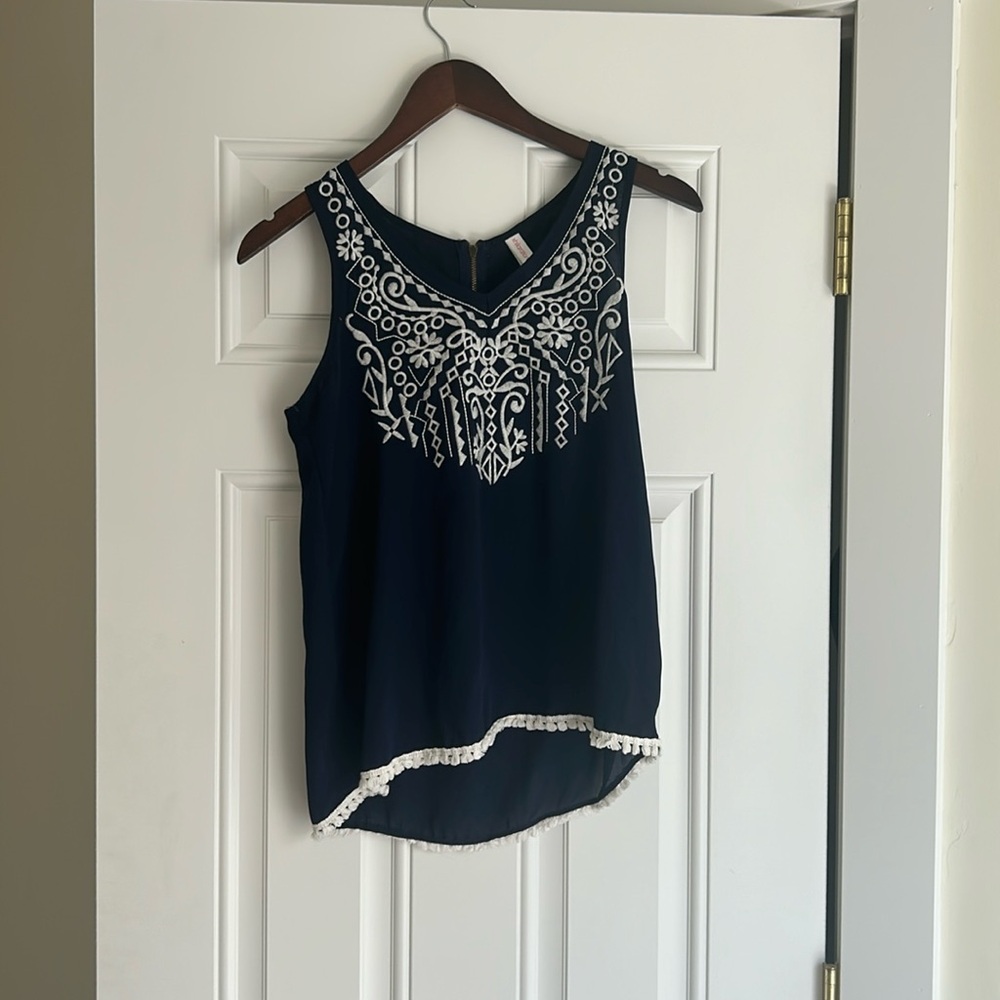 Blue and white xhilaration tank top.
